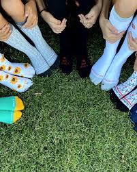 Sockietalkies shown in a group on grass